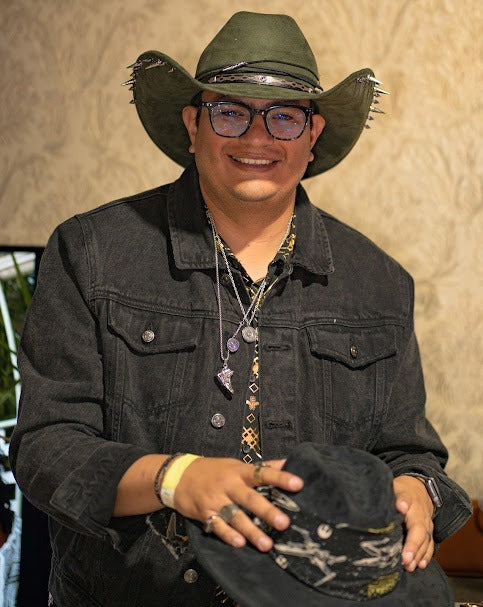 Guest in a green Numa cowboy hat
