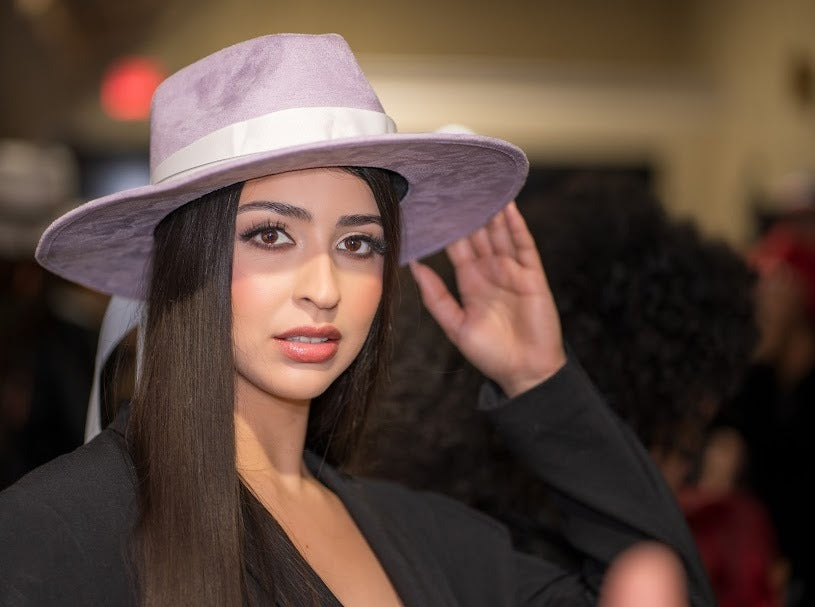 Guest in a lavender Numa hat
